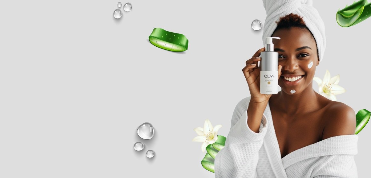 Woman holding an Olay body lotion